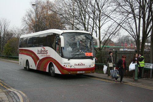 FJ03 VND with Bullock of Cheadle, a Volvo B12M with Caetano bodywork, brings more Liverpool-bound passengers to Eccles